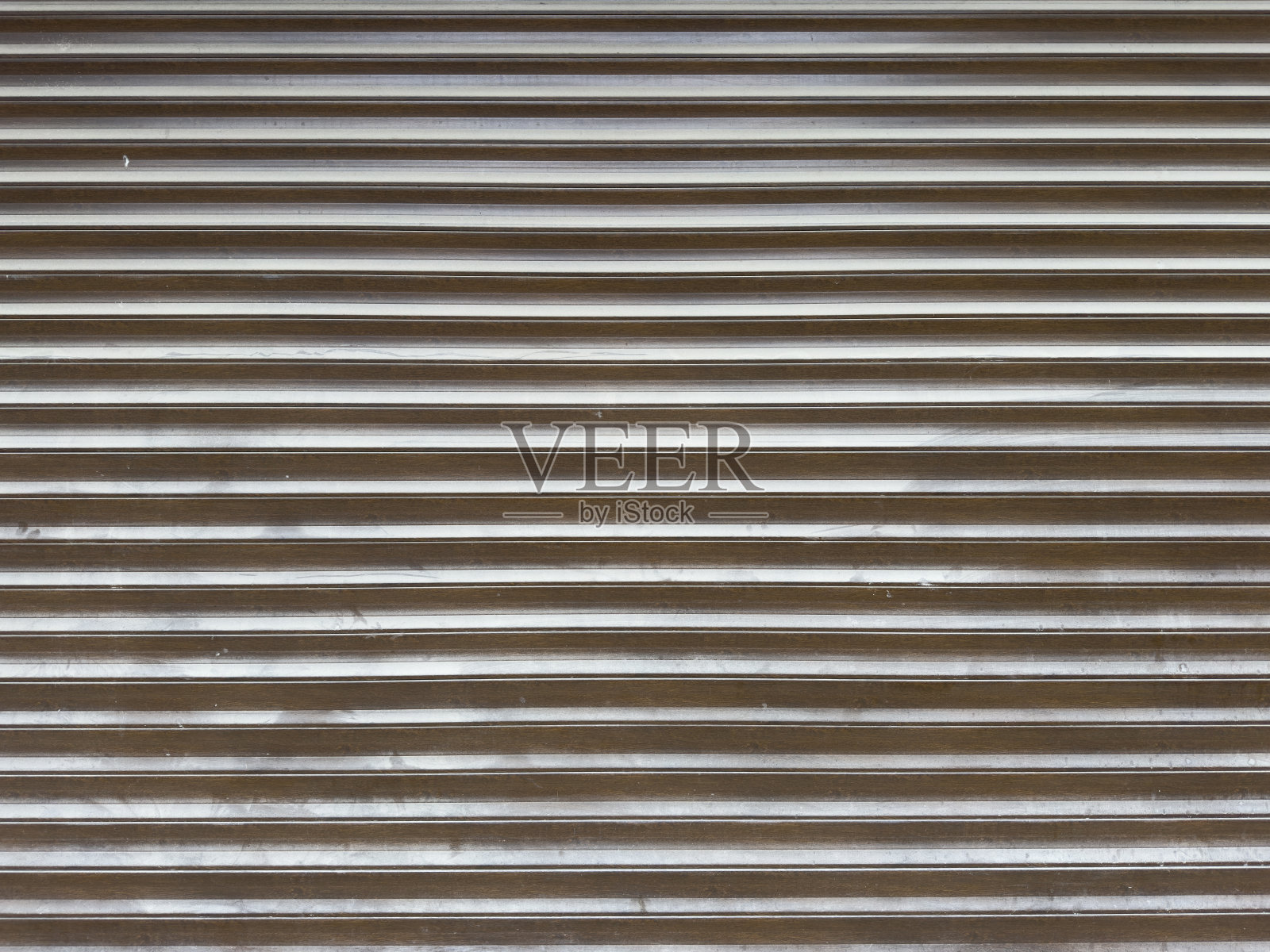 旧风化和生锈的钢门为钢金属背景和纹理。没有人。照片摄影图片