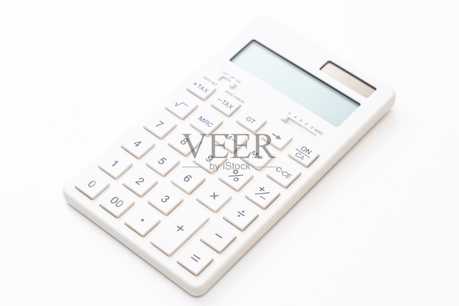 计算器在一个白色的背景。照片摄影图片