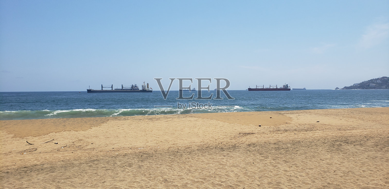 船只在曼萨尼约海滩照片摄影图片