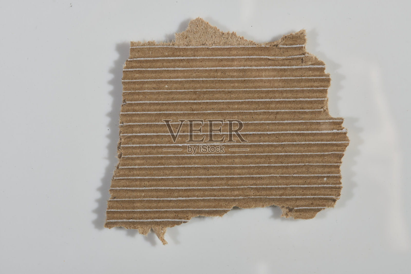 棕色瓦楞纸板的纹理背景。照片摄影图片