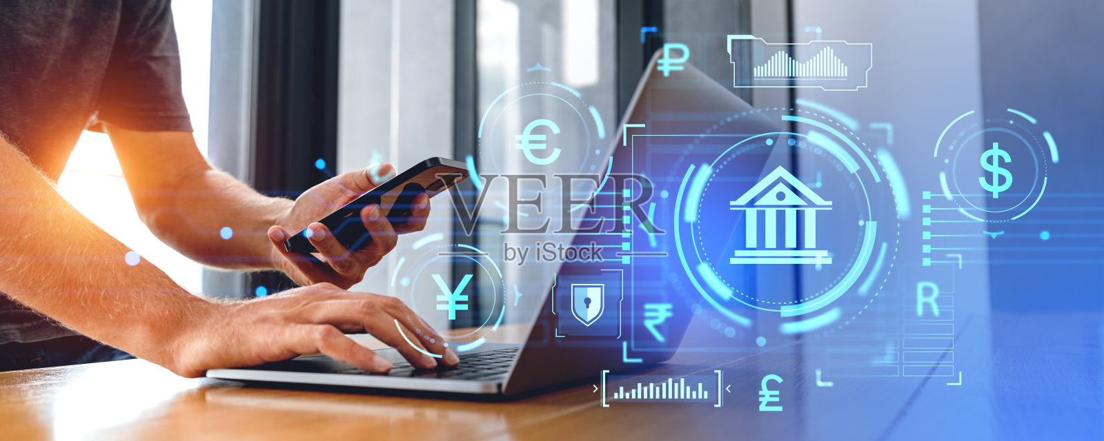 人手与笔记本电脑和手机和CBDC接口照片摄影图片