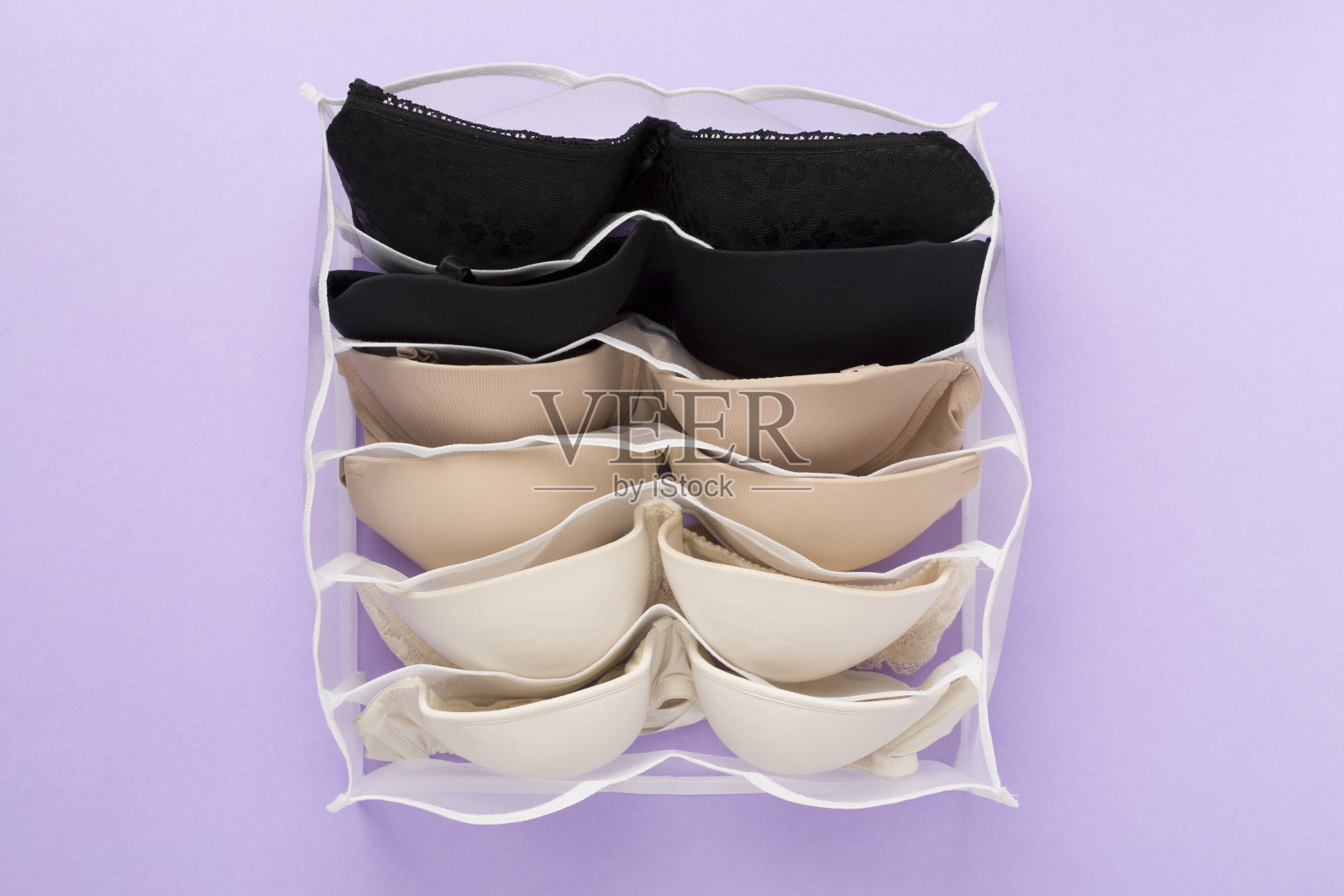 内衣组织者在彩色背景，顶视图照片摄影图片