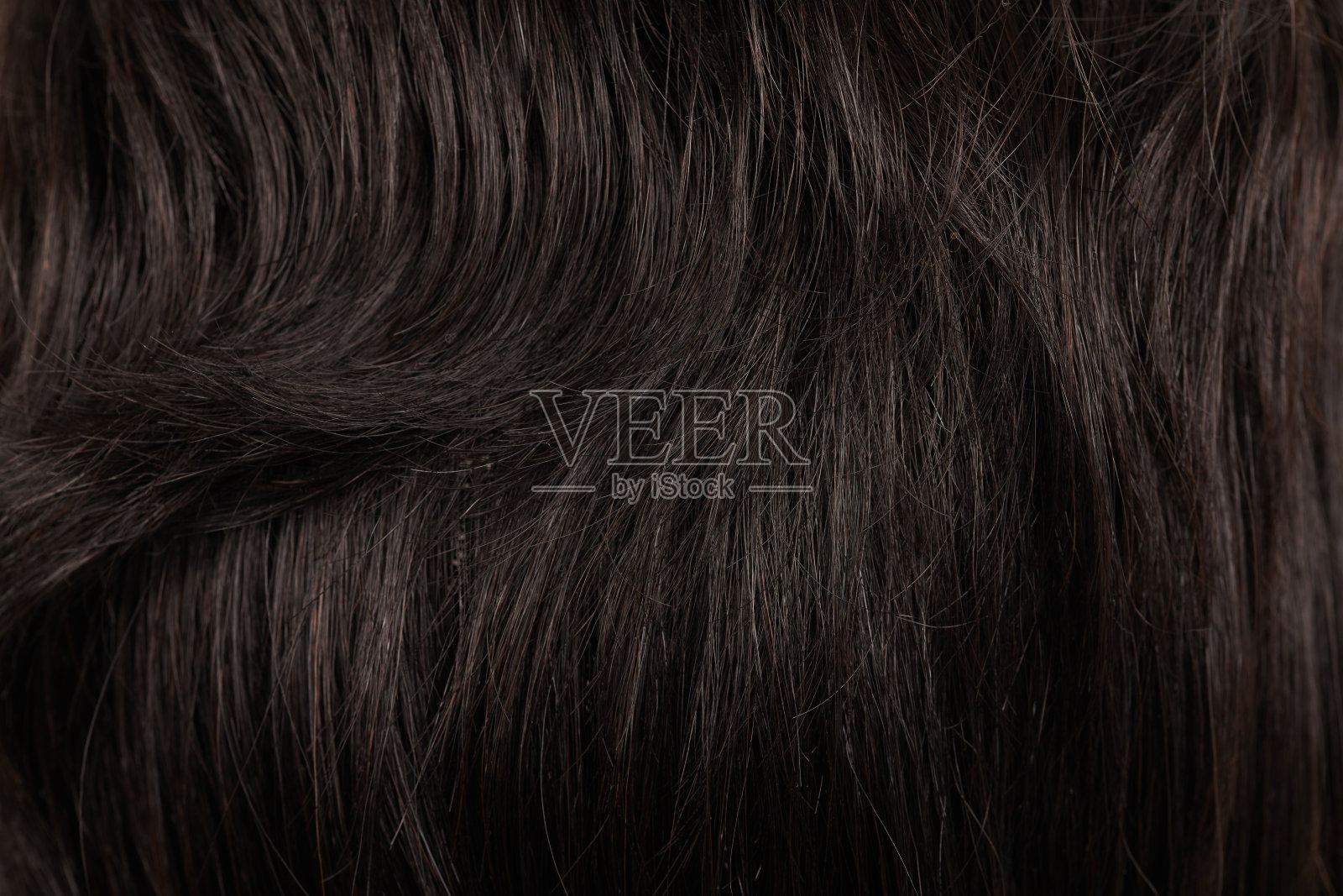 自然光泽的深色卷发背景特写镜头照片摄影图片
