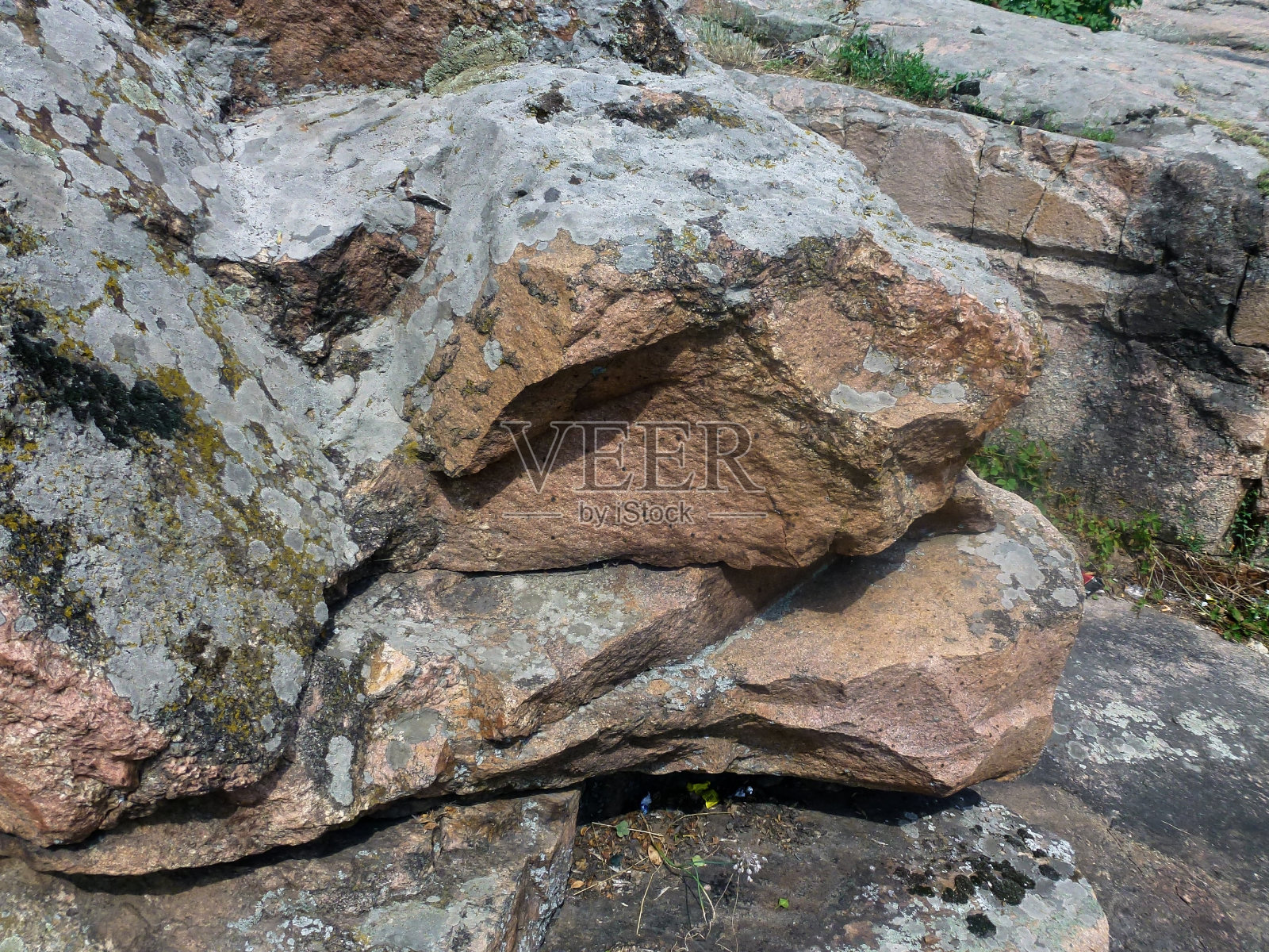 石头背景特写。从上面看照片摄影图片
