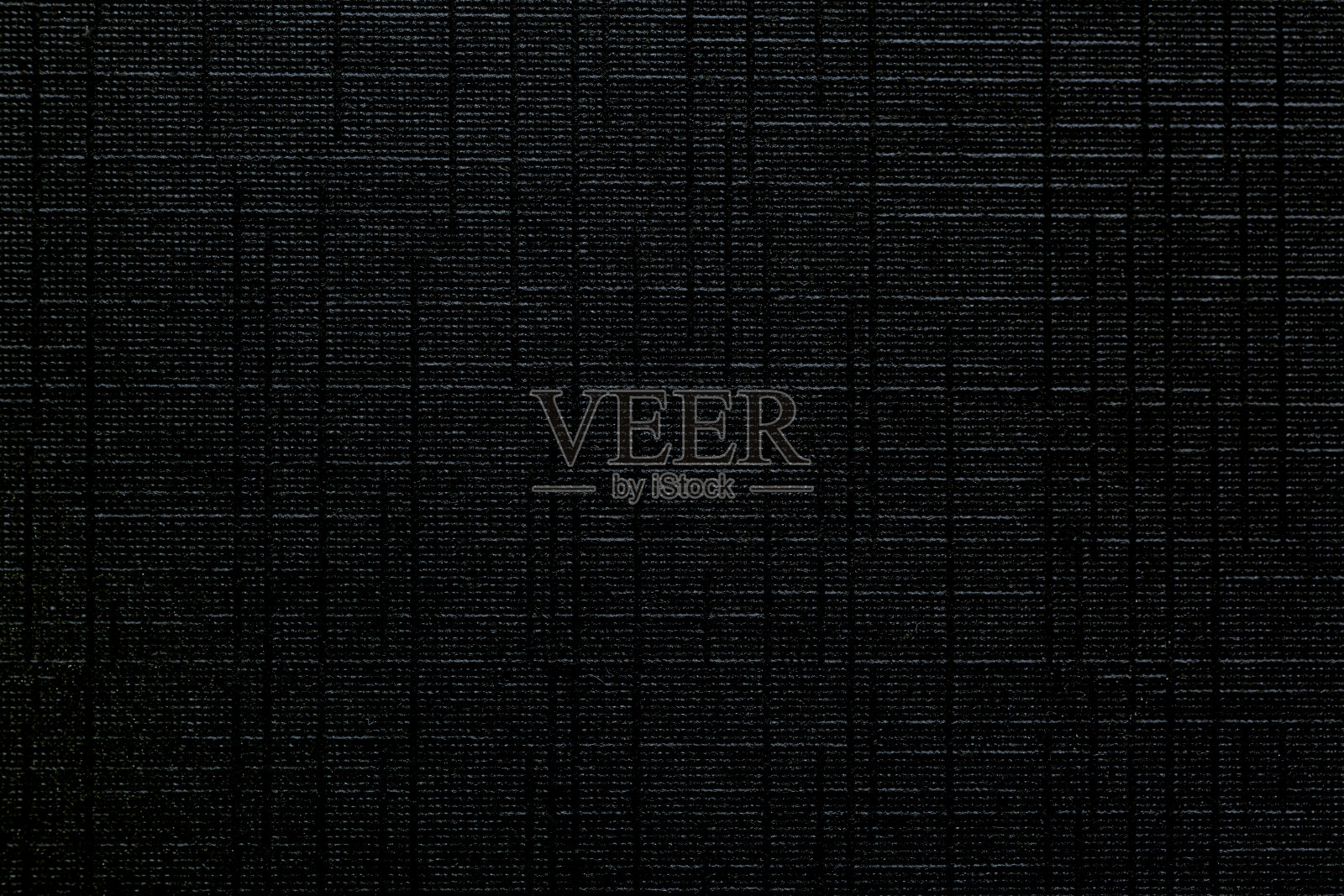 黑色背景纹理特写，微距黑色背景纹理，纹理银或不锈钢六边形背景无缝图案。抽象、艺术和近距离物体概念照片摄影图片