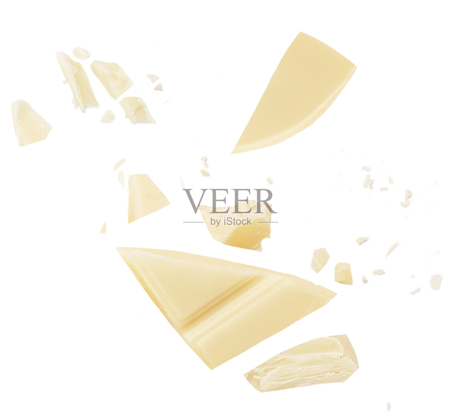 白巧克力爆炸孤立在白色背景。巧克力碎块包装设计。照片摄影图片