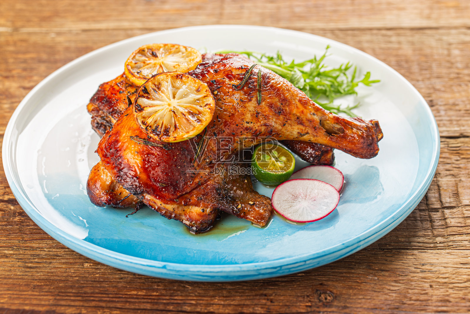 烤鸡腿照片摄影图片