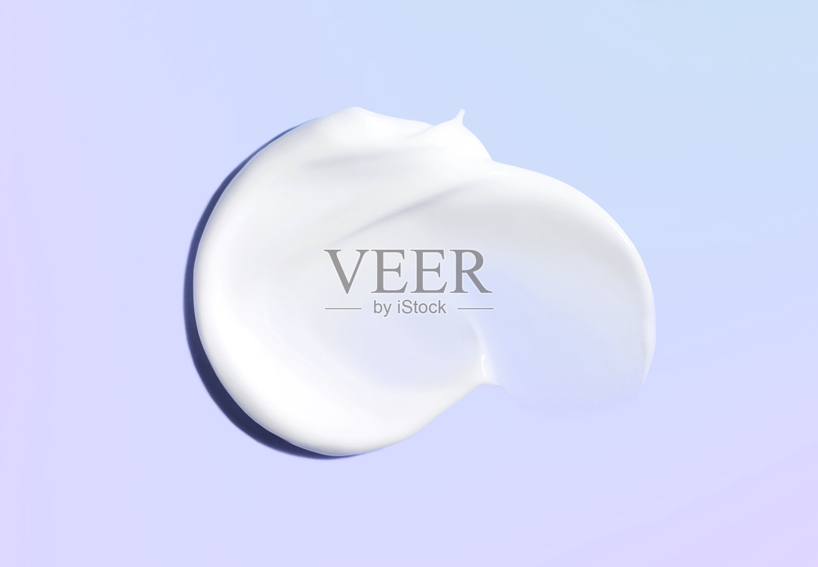 化妆涂抹霜质地在柔和的彩色背景照片摄影图片