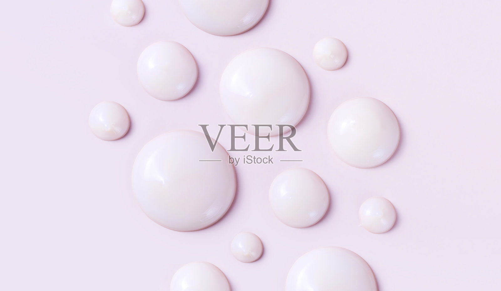 化妆品涂抹的奶油纹理滴在柔和的粉红色背景照片摄影图片