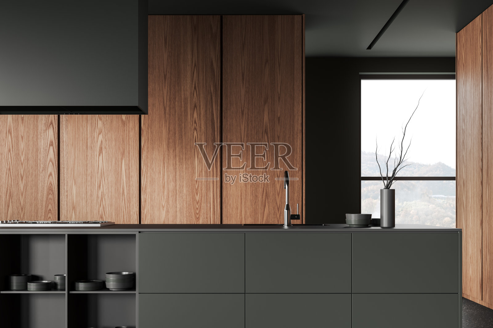 黑暗的家庭厨房内部，酒吧台面和全景窗照片摄影图片