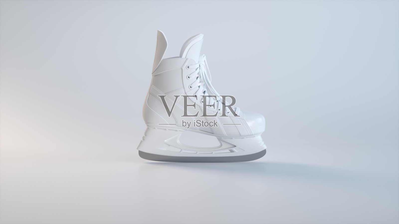 白色滑冰软灰色工作室背景。体育的概念。照片摄影图片