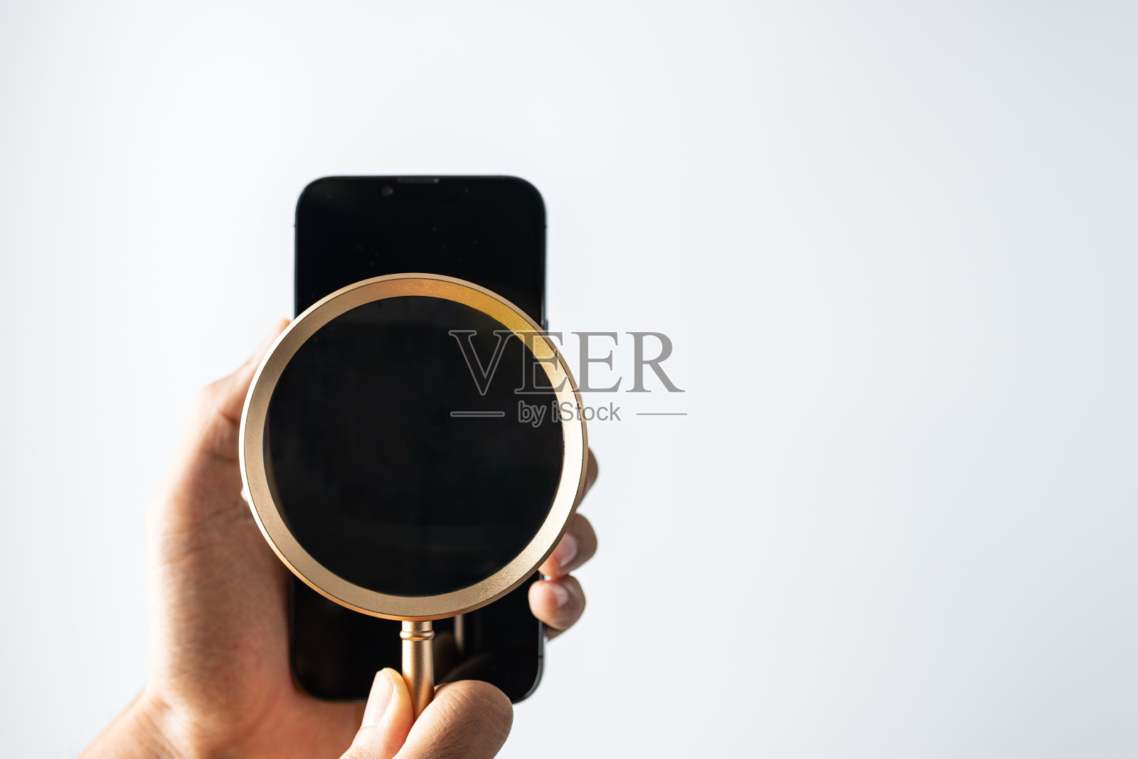 创新在线搜索手机放大镜在线搜索和网络安全概念。照片摄影图片