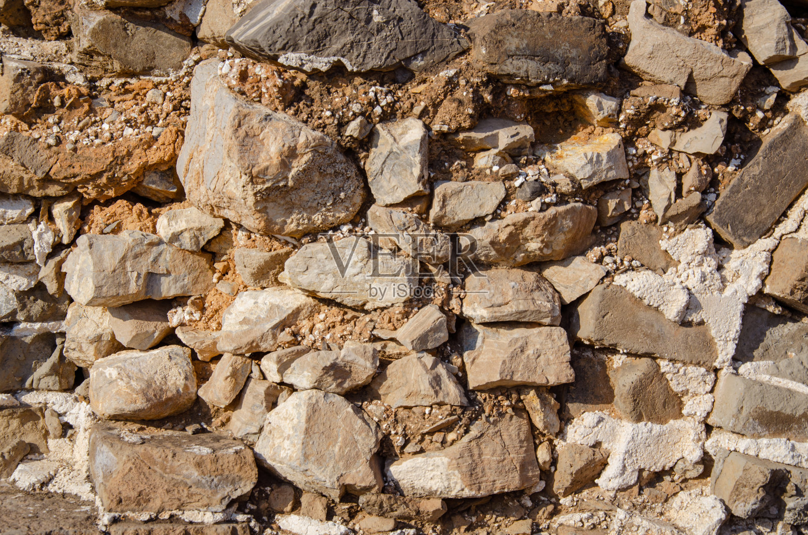 纹理岩石碎片。接近一块山的艺术背景。山石岩石照片摄影图片