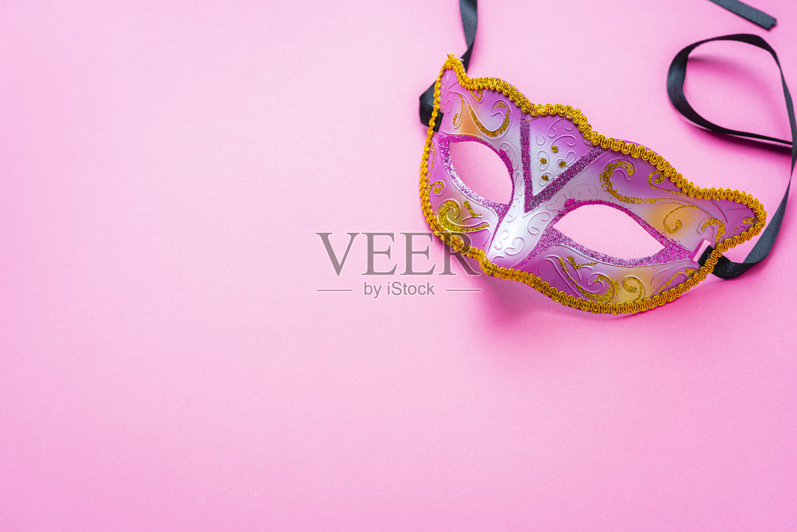粉色狂欢节面具照片摄影图片