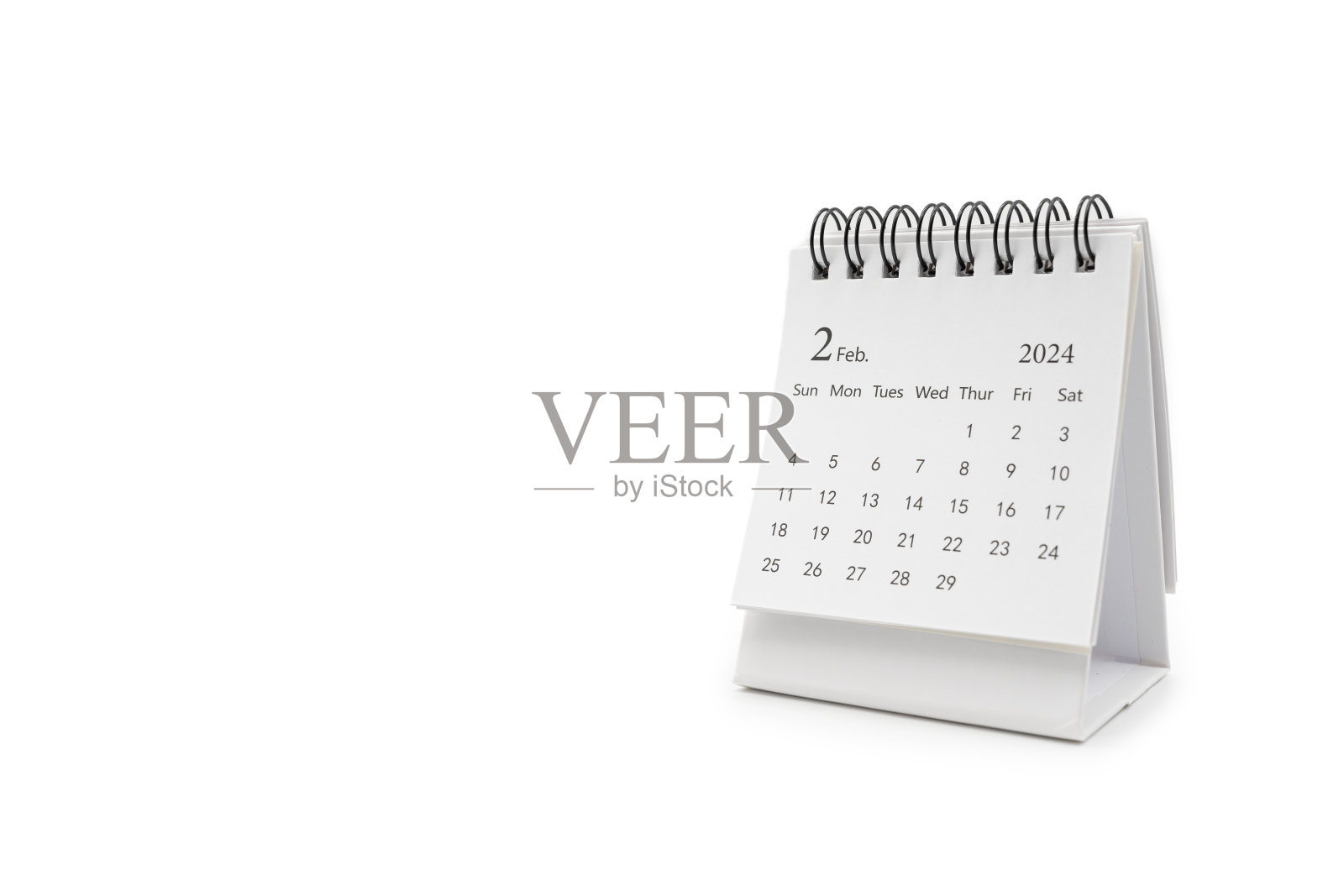 简单的办公桌日历FEB 2024隔离在白色背景上。照片摄影图片