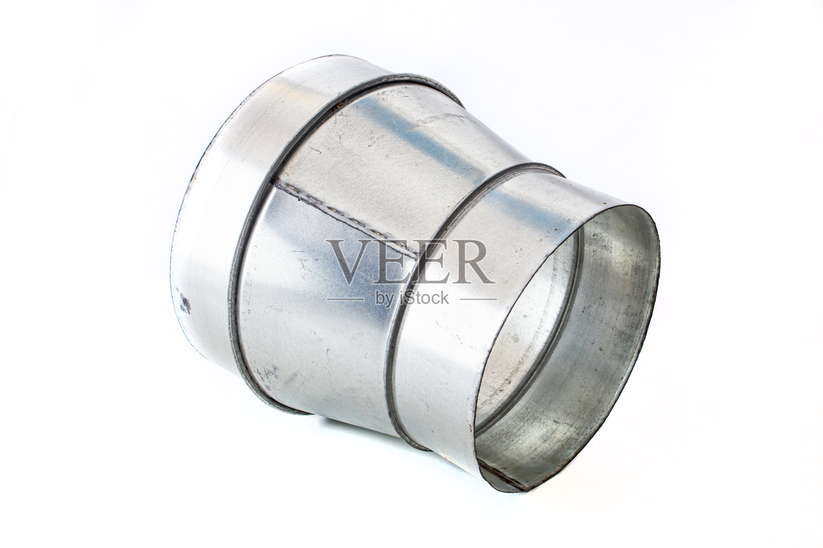 白色孤立背景上圆形管道的直径转换特写照片摄影图片