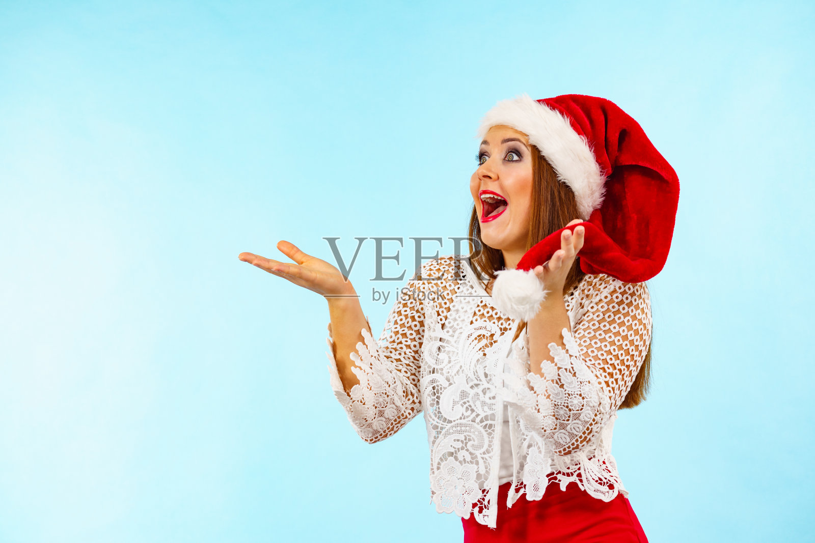 震惊的圣诞老人圣诞女人照片摄影图片