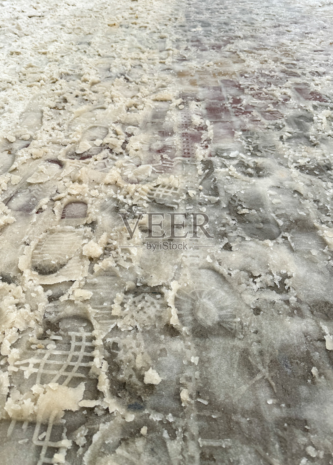 铺着雪的石板。背景照片摄影图片