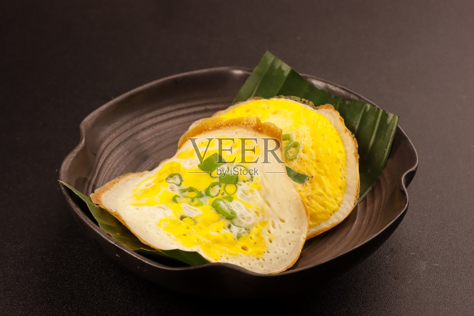 沙拉比或沙拉比或沙拉比配蛋，是印尼的传统食物和美食。照片摄影图片