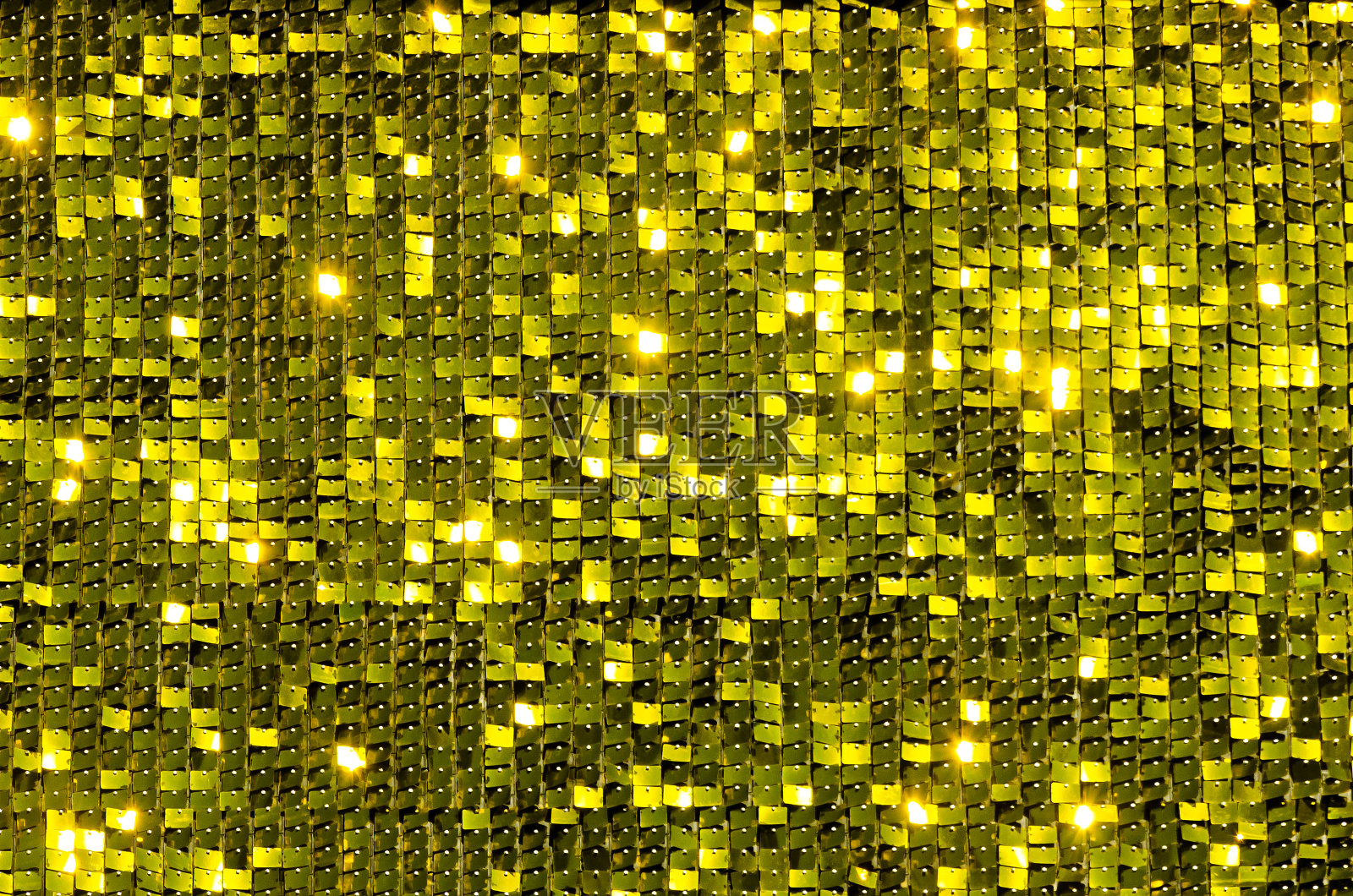 金色抽象纹理背景，金色美丽元素，抽象金色迪斯科背景，反射和眩光，音乐，派对和舞蹈概念。照片摄影图片