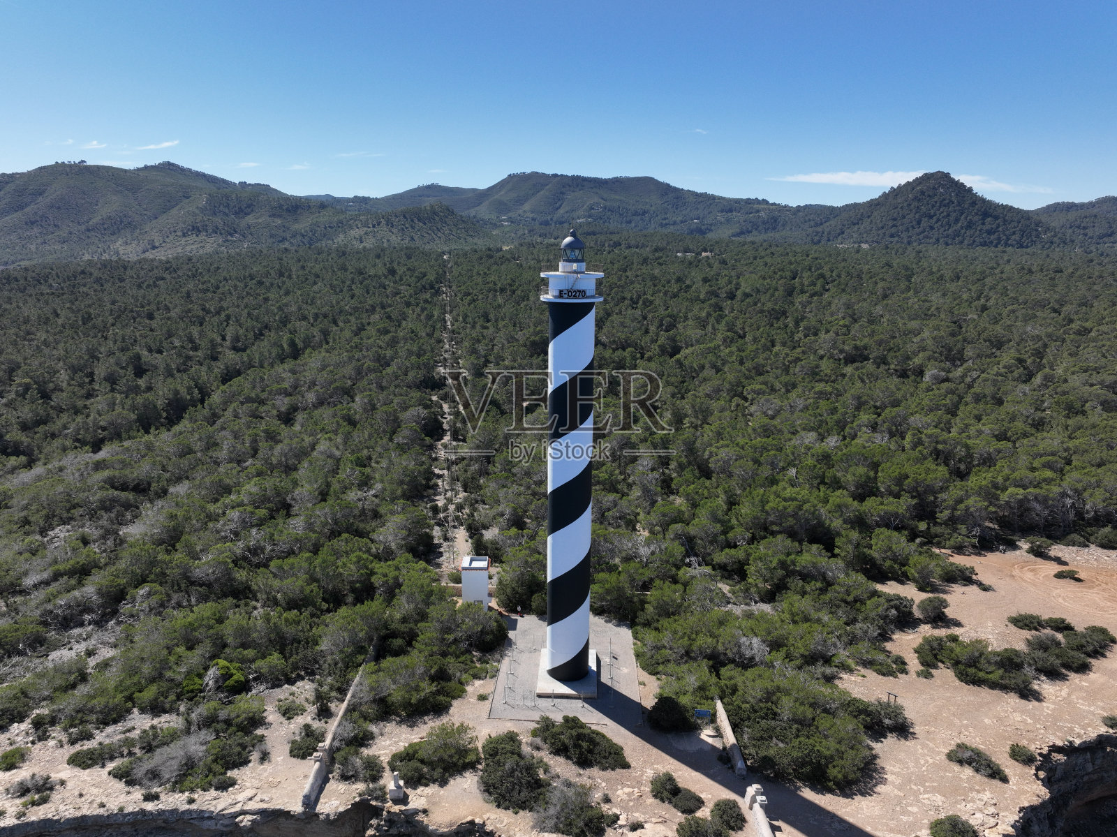 莫斯卡特灯塔位于伊比沙岛北部的波尔蒂纳克斯镇照片摄影图片