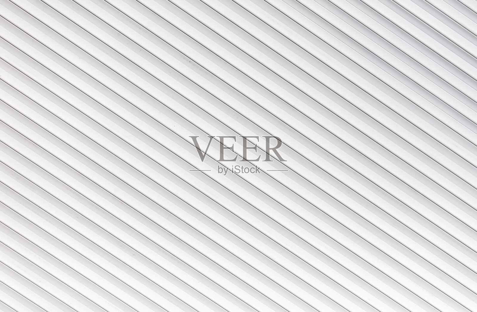 白色金属卷帘门纹理背景。质感白色金属卷帘门照片摄影图片