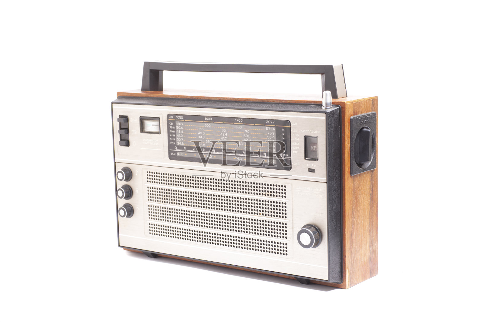 老式晶体管收音机。英文翻译:设定指标，网络，量程，地标标尺，8波段，dv, sv, 5kv, vhf(俄文铭文)。照片摄影图片