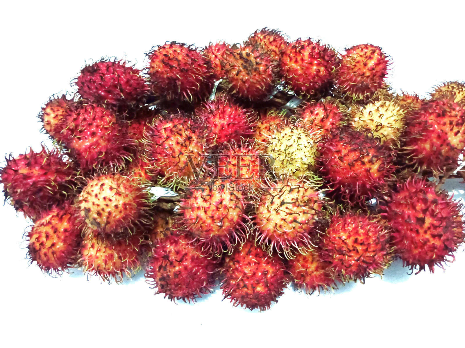 白色背景上的红毛丹果实照片摄影图片