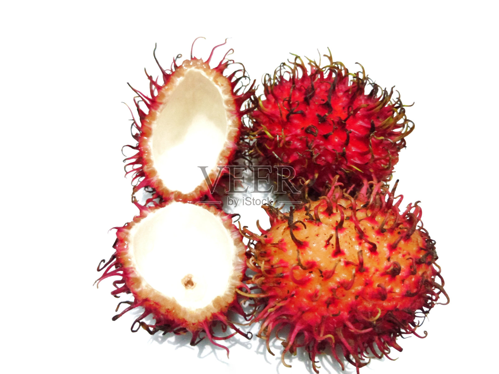 白色背景上的红毛丹果实照片摄影图片