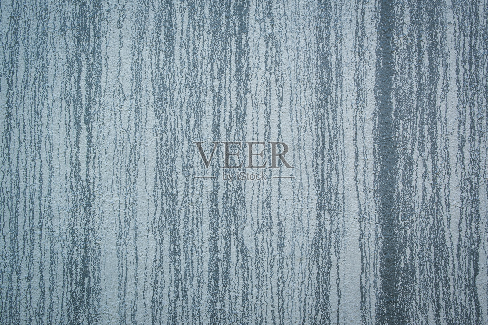 灰色的混凝土墙，上面布满了油漆照片摄影图片