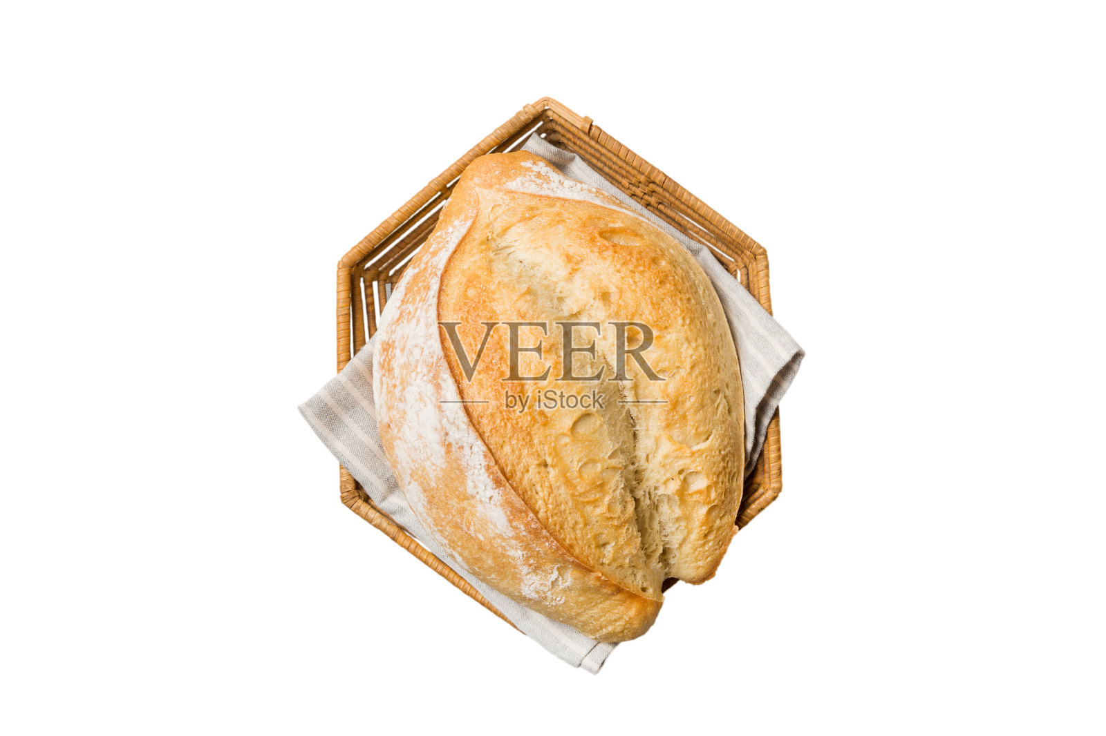 新鲜出炉的面包放在白色背景的篮子里。俯视图面包复制空间照片摄影图片