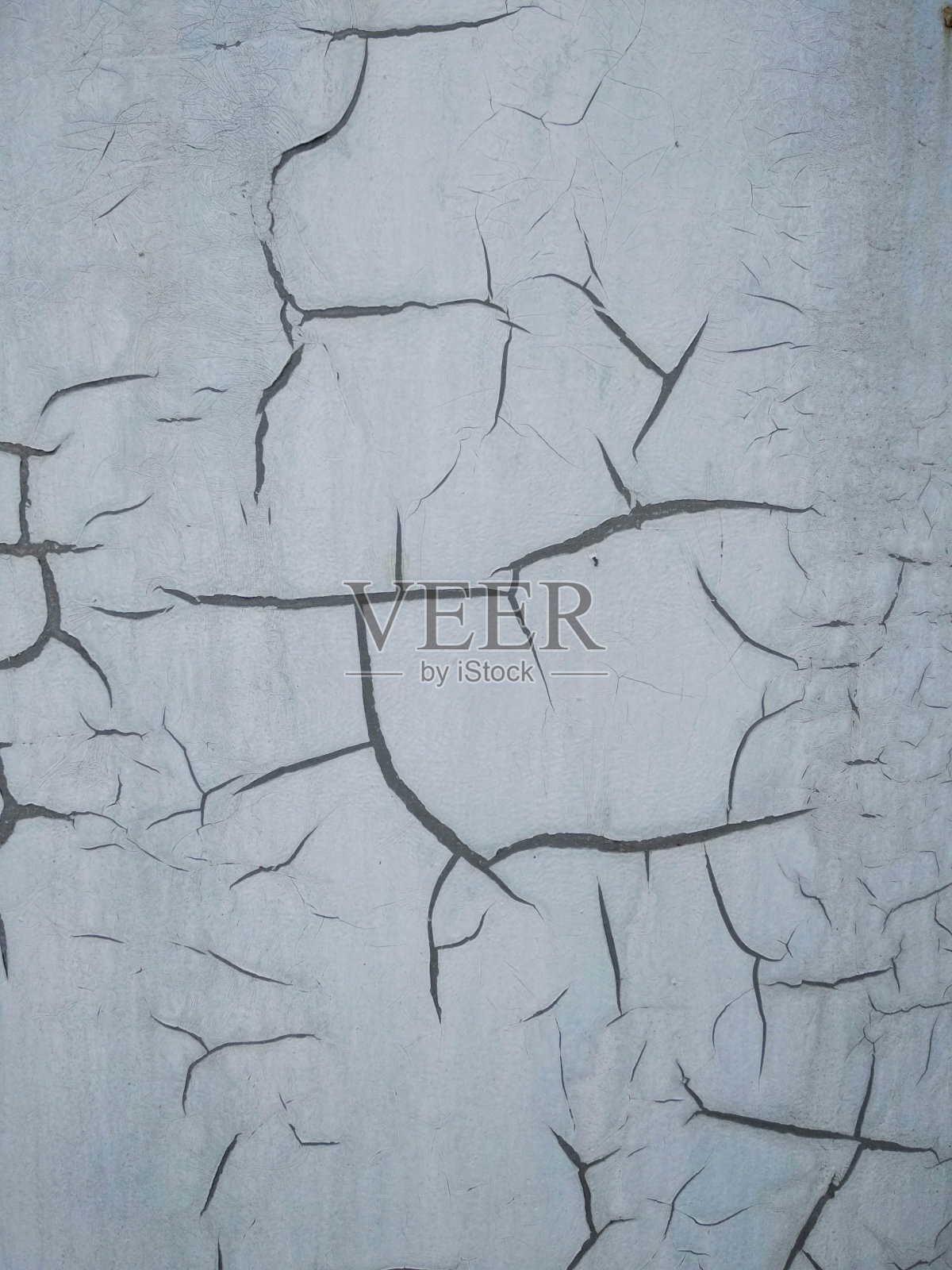 一堵有裂缝的白墙照片摄影图片