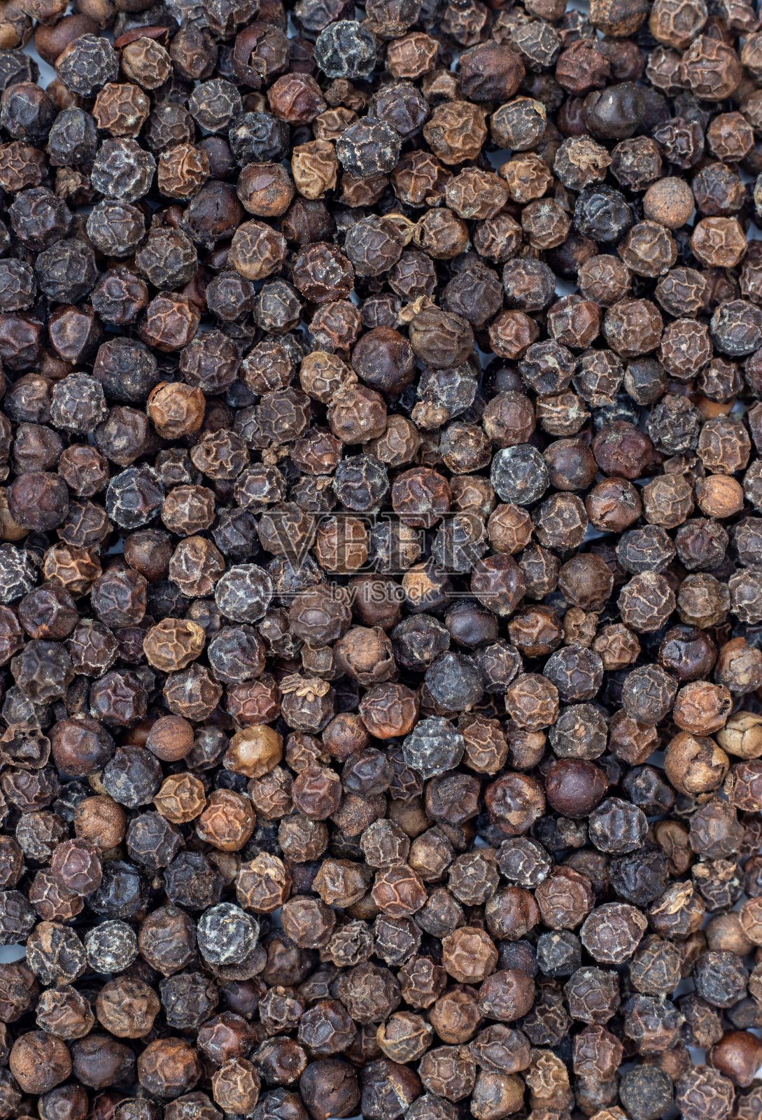 干黑胡椒背景与复制空间，香料和调味品照片摄影图片