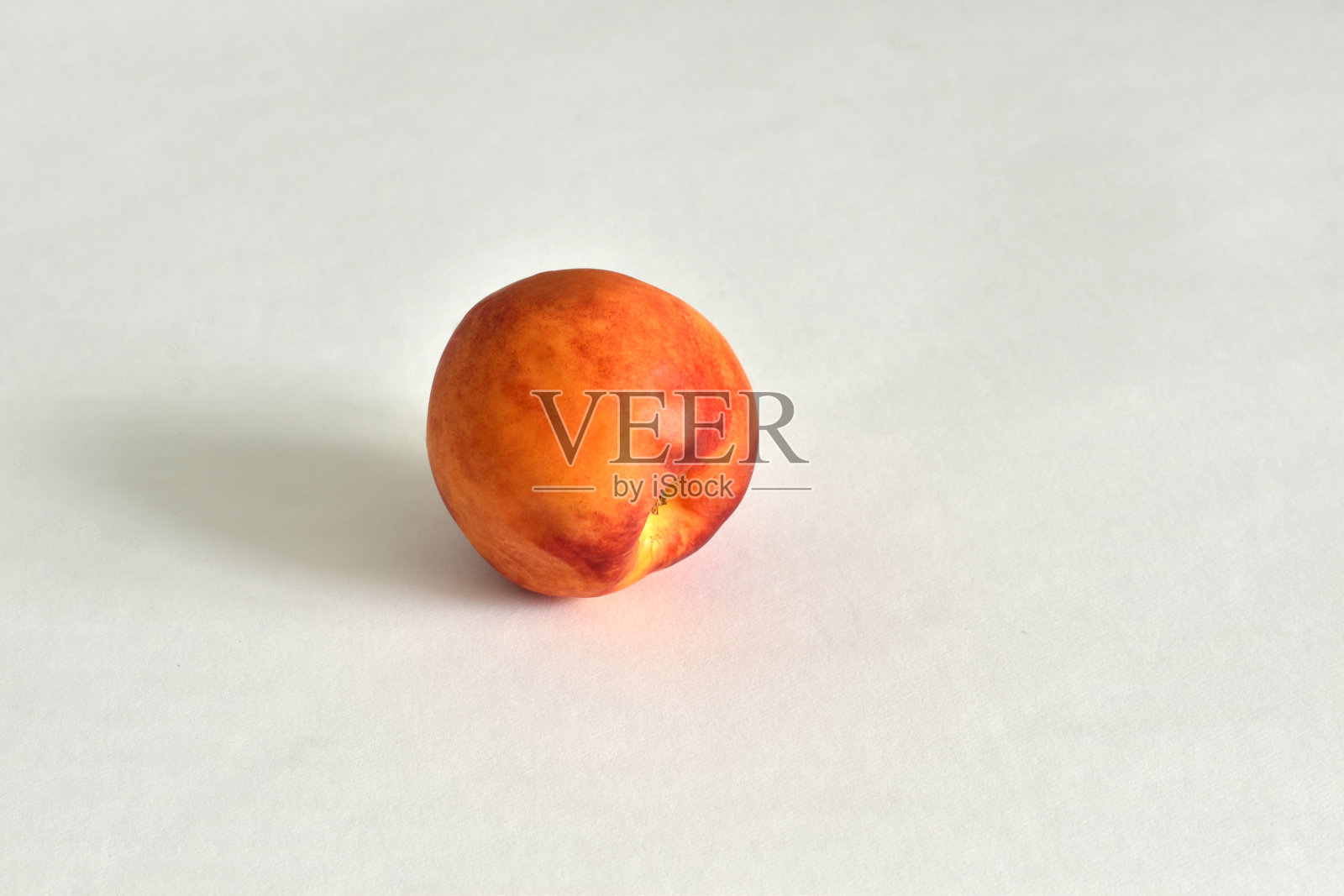 粉色油桃果。照片摄影图片