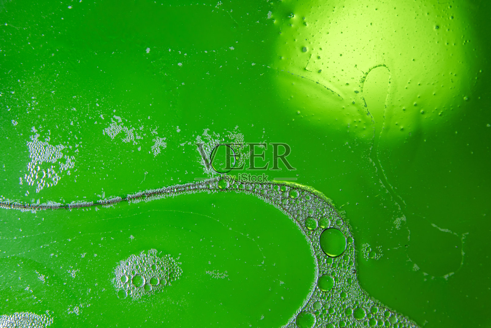 通过混合水和油获得的纹理和背景。然后用微距镜头记录图像。照片摄影图片