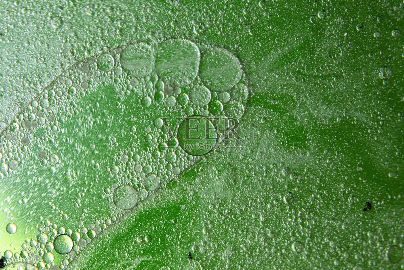 通过混合水和油获得的纹理和背景。然后用微距镜头记录图像。照片摄影图片