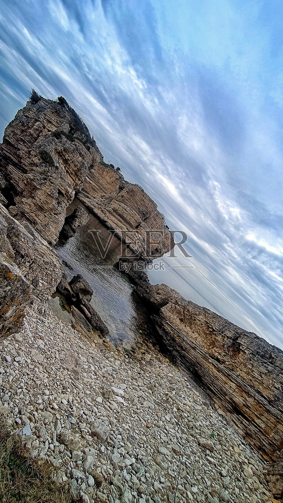 倾斜岩湾照片摄影图片