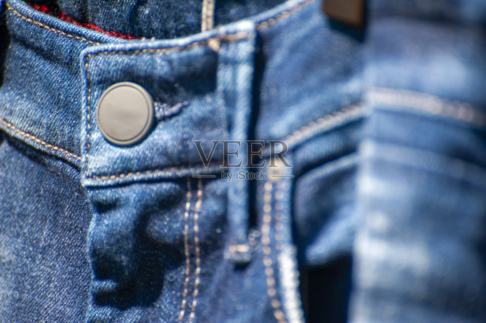 牛仔裤细节照片摄影图片