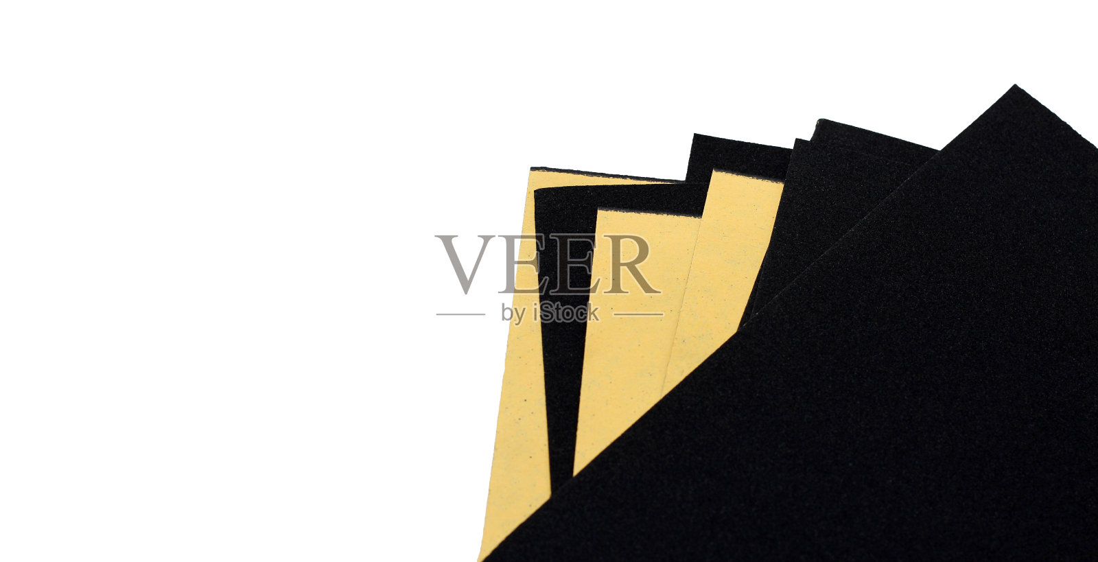 白底黑砂纸。照片摄影图片