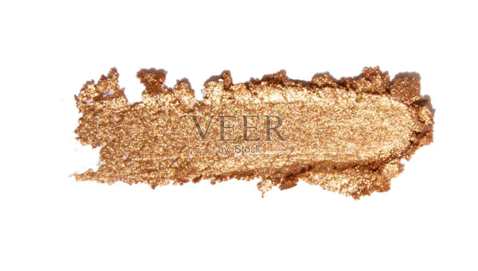 在空白的背景上涂抹金色眼影照片摄影图片