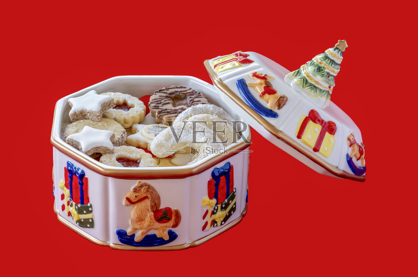 圣诞烘焙在一个彩色饼干罐照片摄影图片