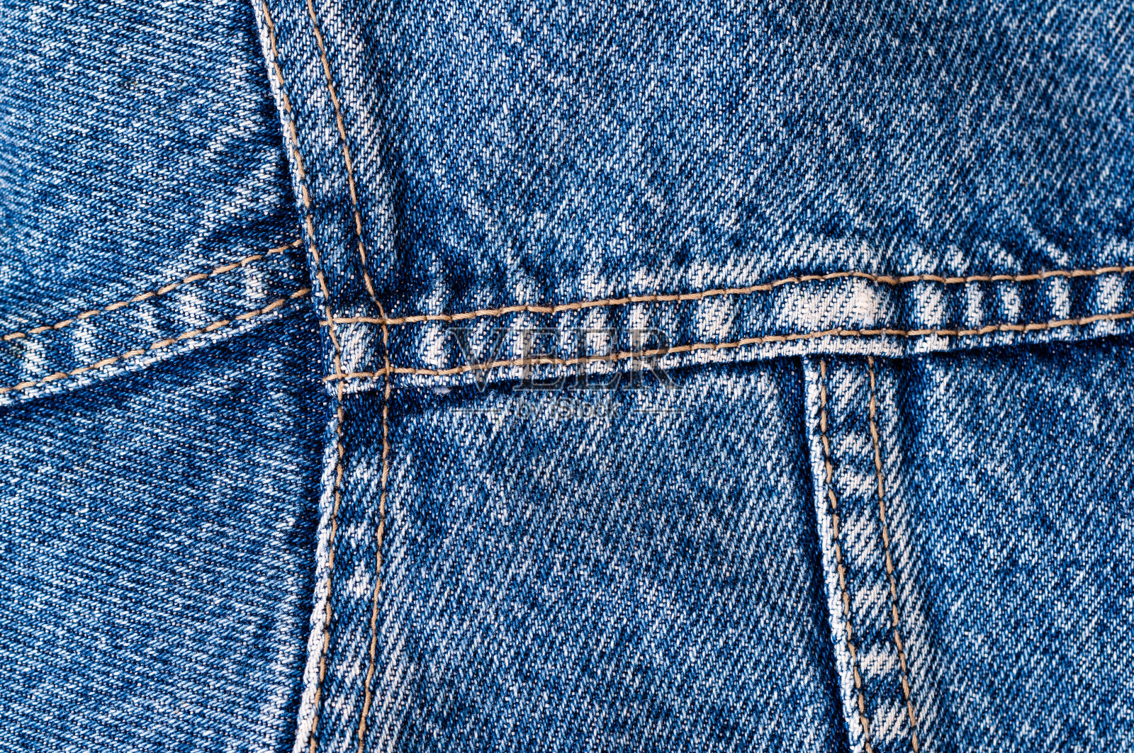 牛仔面料的特写照片摄影图片
