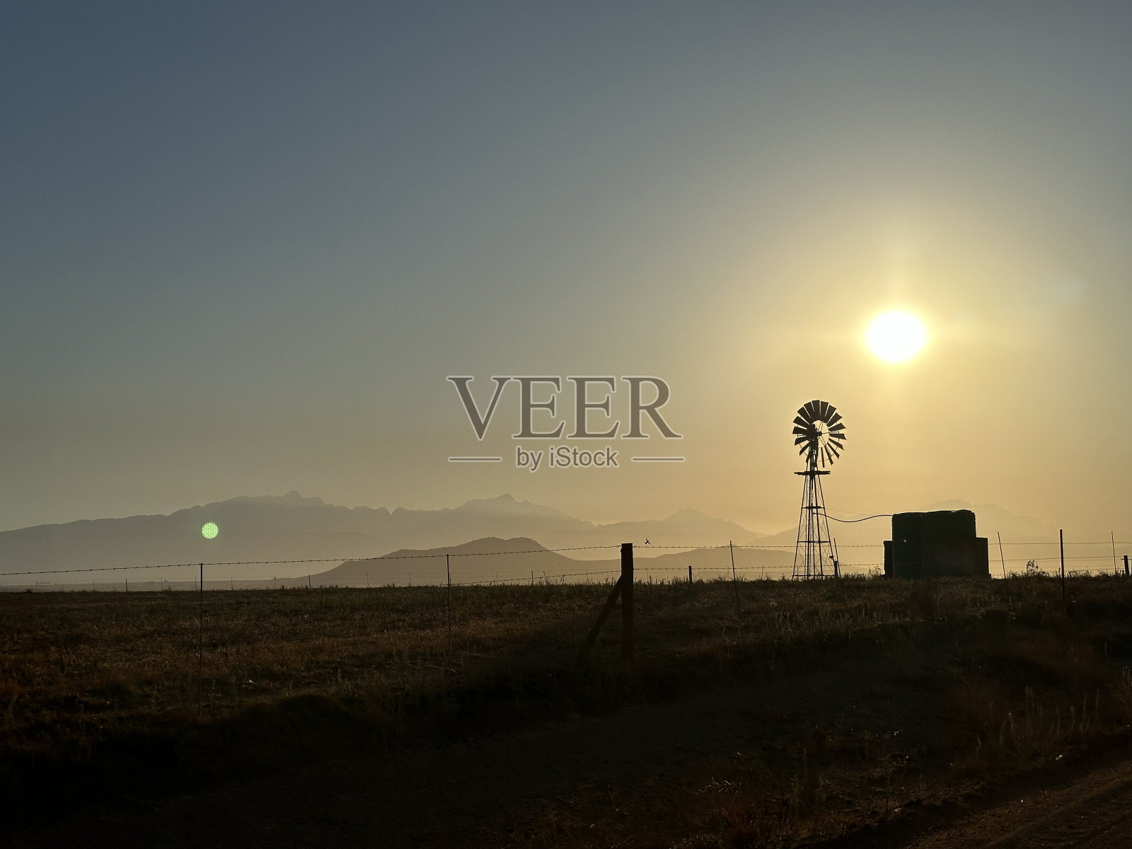 日出风车剪影照片摄影图片