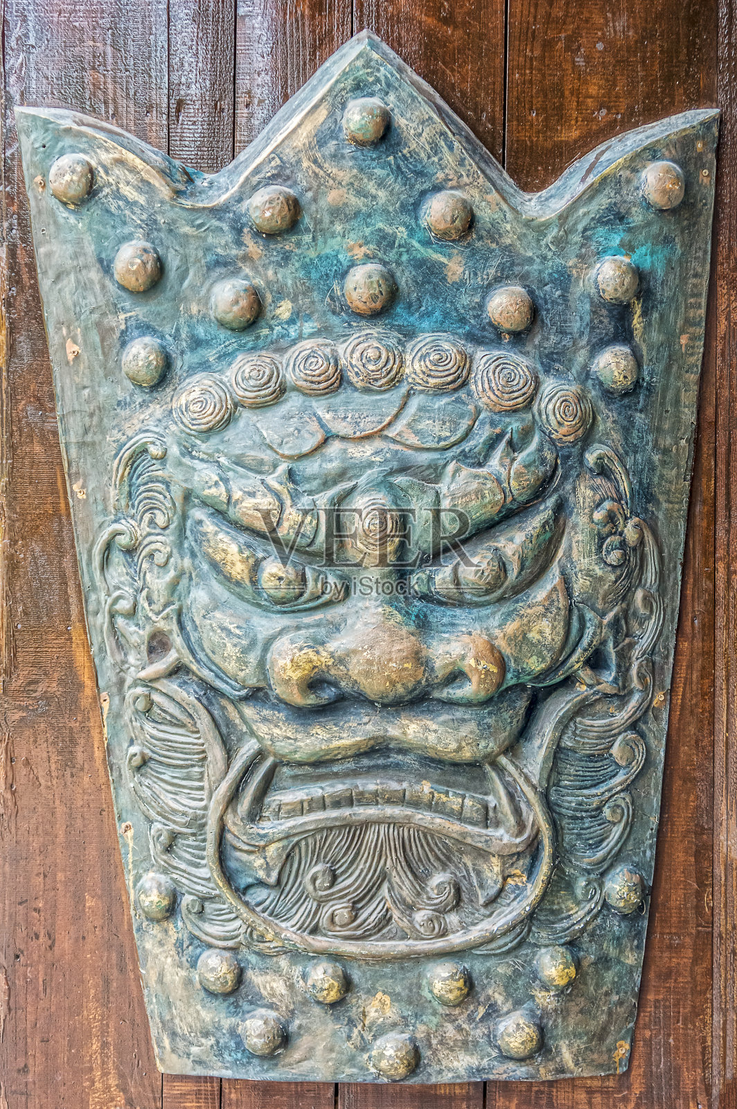 古老的古中国形象的铁怪物脸照片摄影图片