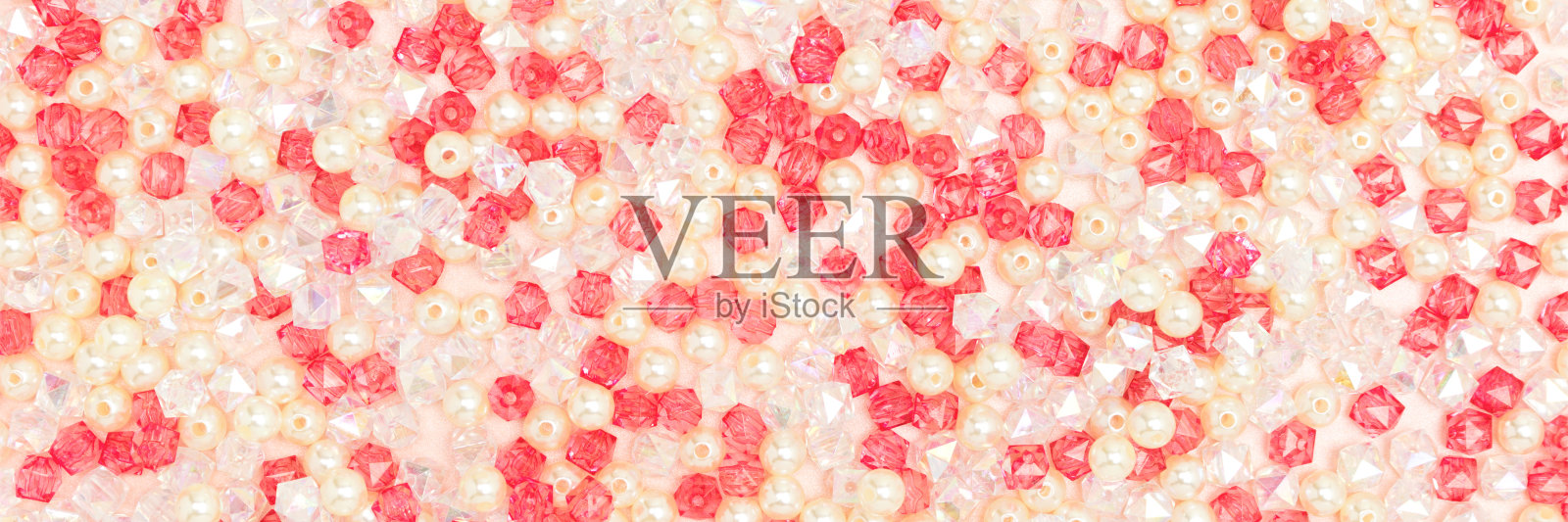 由各种丙烯酸珠制成的纹理横幅。照片摄影图片