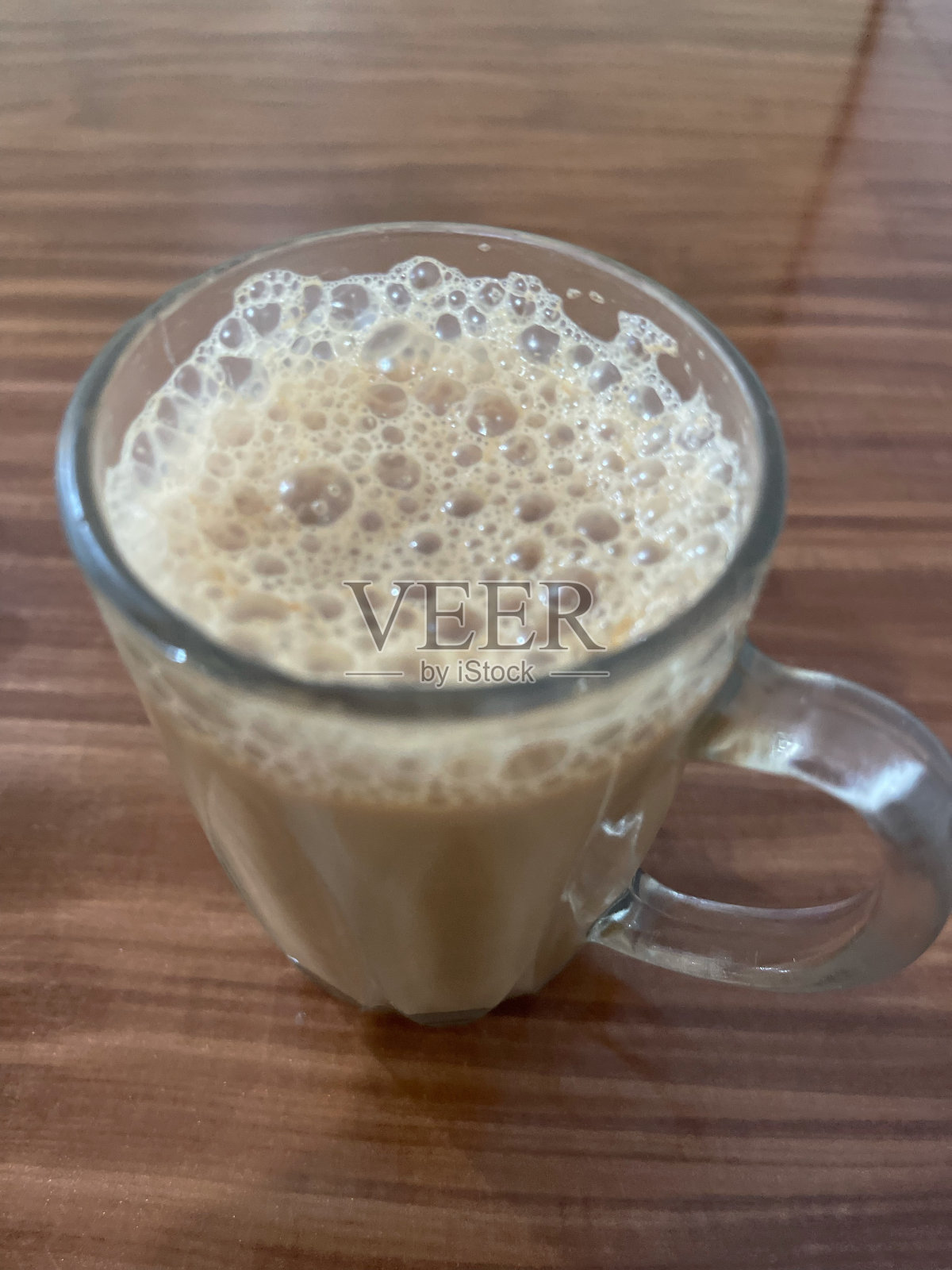 加牛奶的茶在马来西亚俗称Teh Tarik照片摄影图片