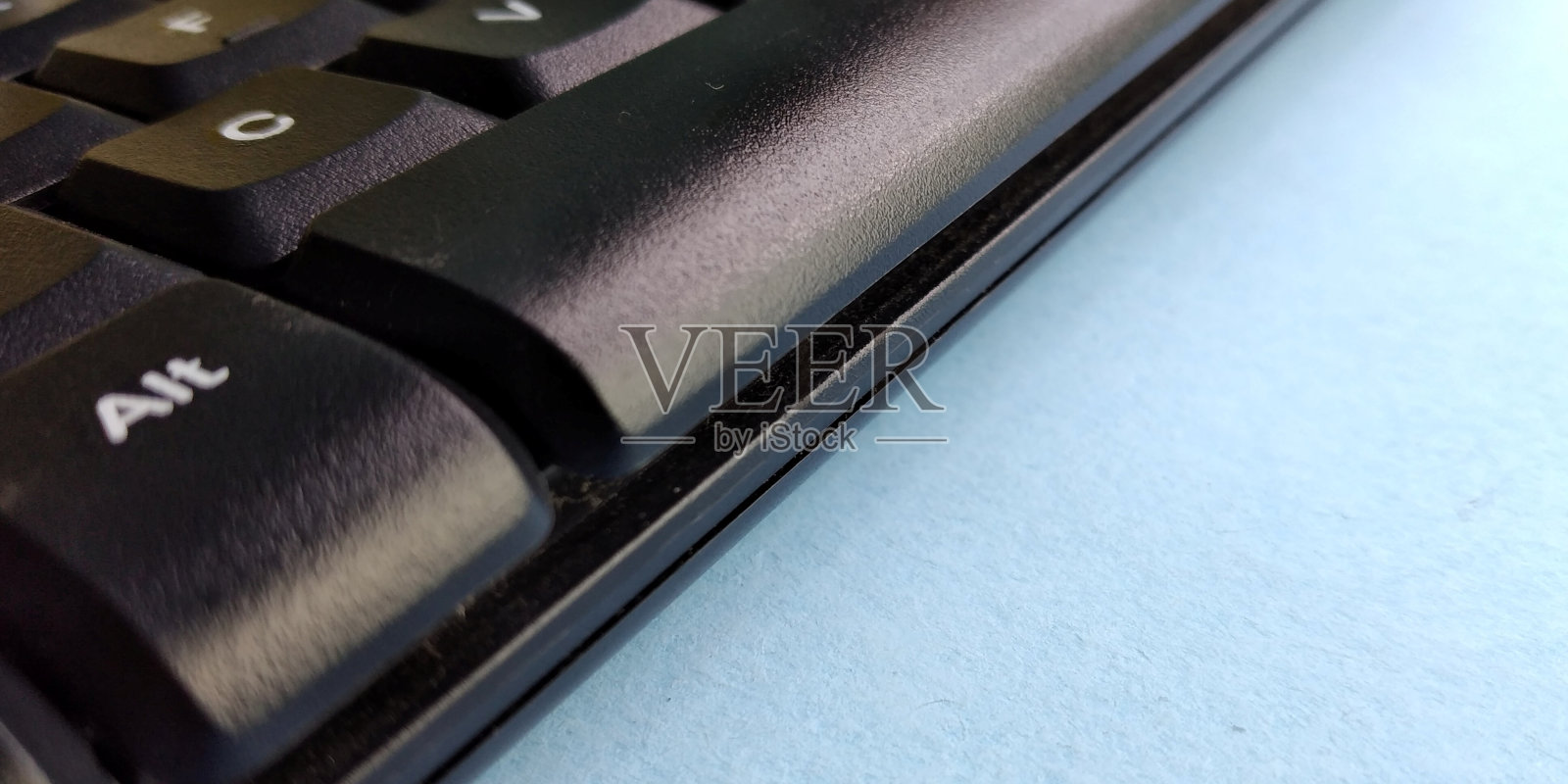 一个黑色电脑键盘的特写照片摄影图片