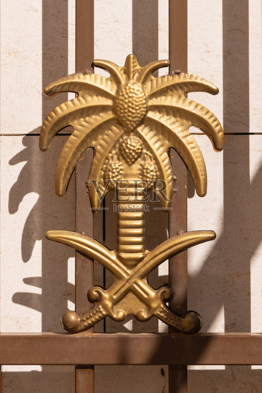 沙特阿拉伯国家的黄铜印章。照片摄影图片