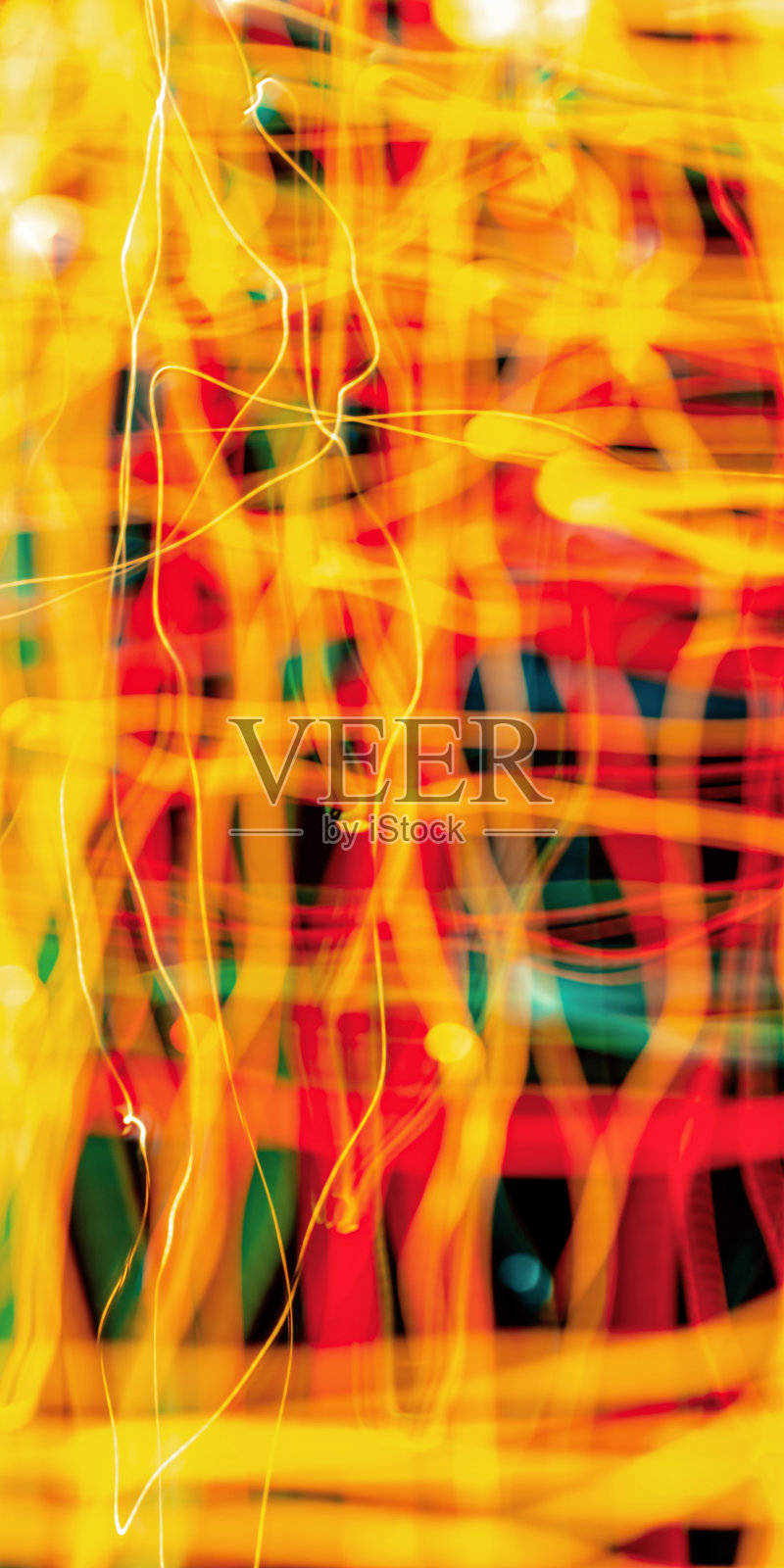 彩色灯光在模糊焦点和运动长曝光照片。模板抽象壁纸。照片摄影图片