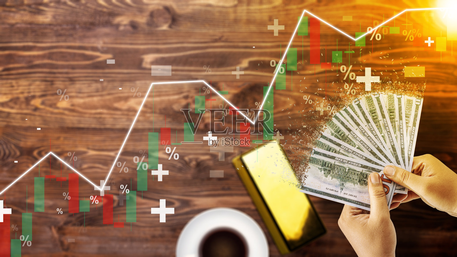 人的手拿着消失的钱，用上升的通货膨胀率图形箭头表示照片摄影图片